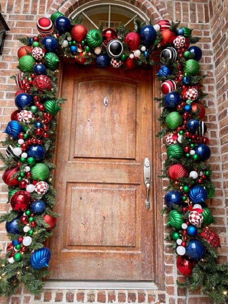 156. Decora&ccedil;&atilde;o natalina para porta de entrada. Fonte: Joycie Lane Designs