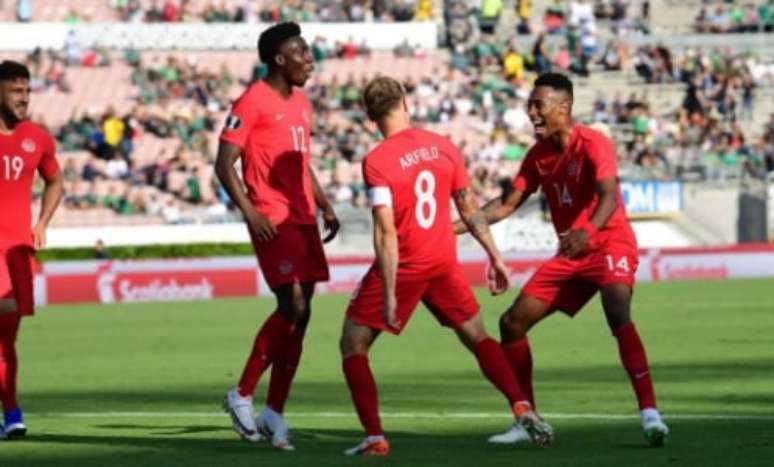 Davies on the pitch for Canada (Photo: Frederic J. BROWN / AFP)