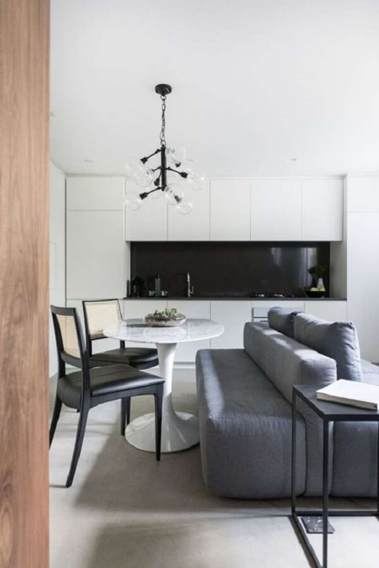 44. Sof&aacute;-ilha para ganhar espa&ccedil;o na decora&ccedil;&atilde;o. Fonte &ndash; Casa de Viver