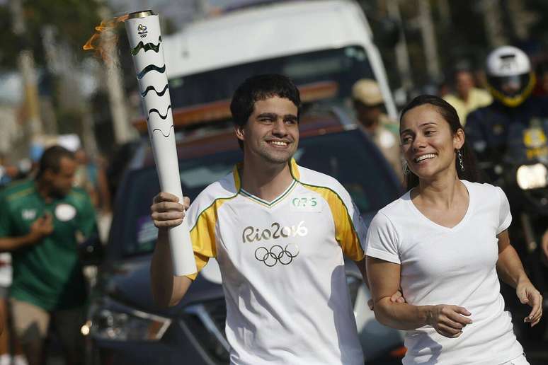 Marcos com a tocha ol&iacute;mpica durante os Jogos do Rio em 2016