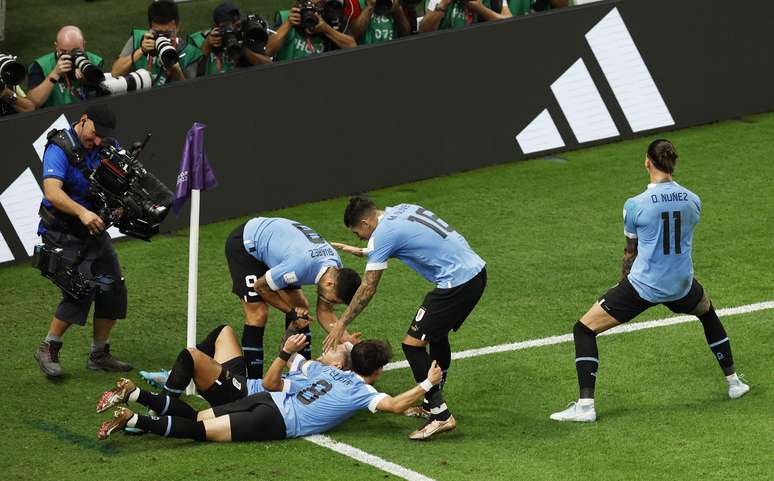 Uruguay's Giorgian de Arrascaeta celebrates scoring their second goal with teammates