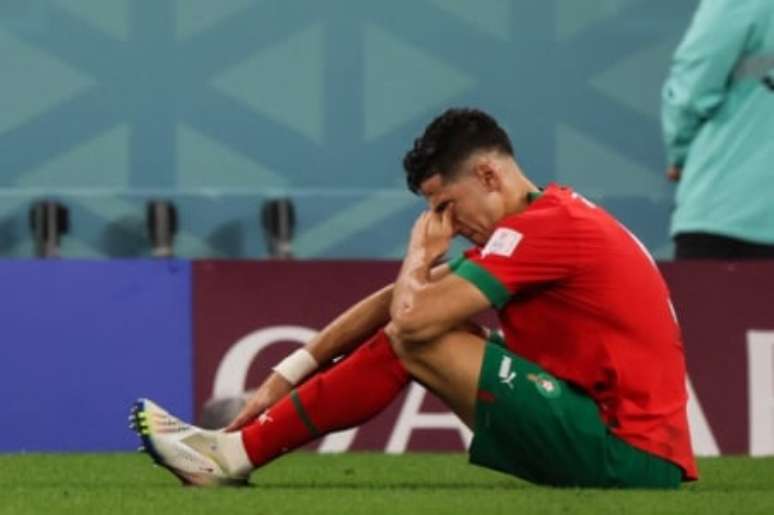 Aguerd lamenta gol contra diante do Canadá, único sofrido pela sua selção na Copa (Foto: JACK GUEZ / AFP)