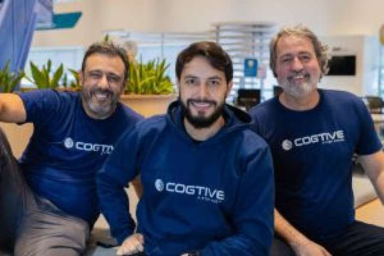 Reginaldo Ribeiro [ao centro], um dos fundadores da COGTIVE, ao lado de C&acirc;ndido Ouro Preto e Ricardo Borgatti Neto