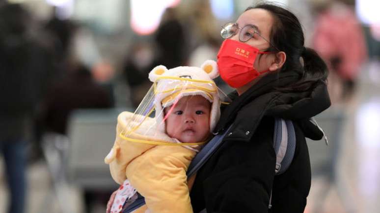 Mulher com bebê em Xangai