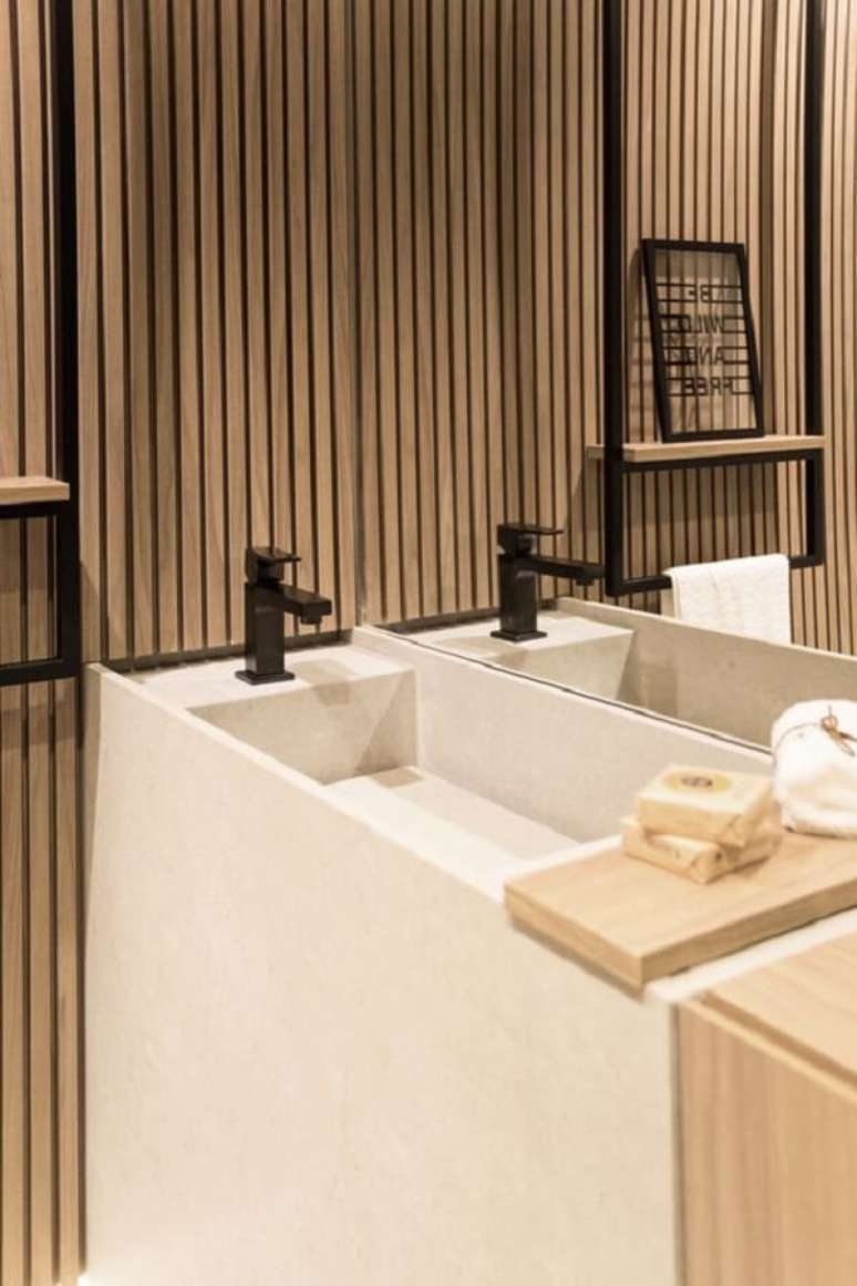 26. Lavabo com porcelanato ripado com bancada esculpida &ndash; Foto claudia Albertini Arquitetos Associados