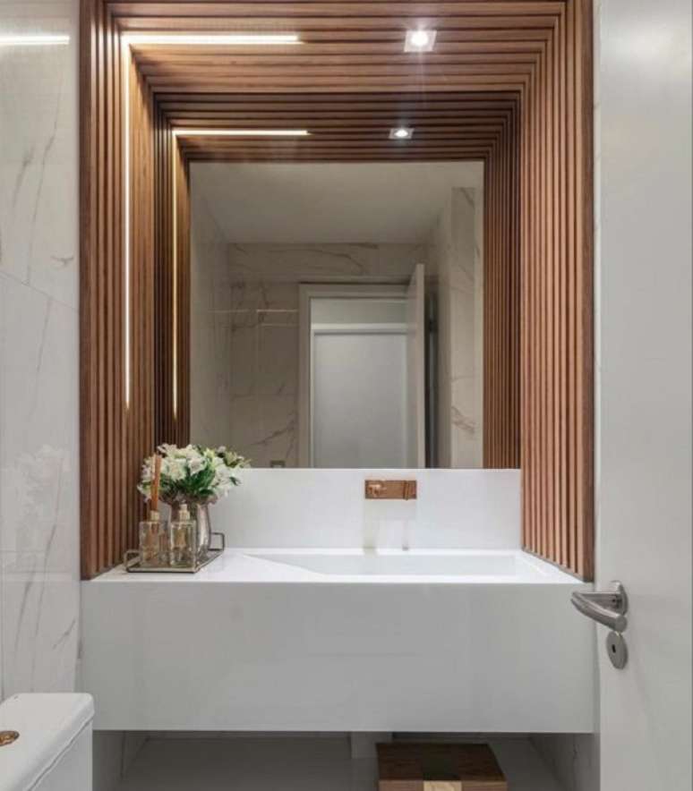 27. Lavabo com revestimento de porcelanato ripado &ndash; Foto Mie Neze