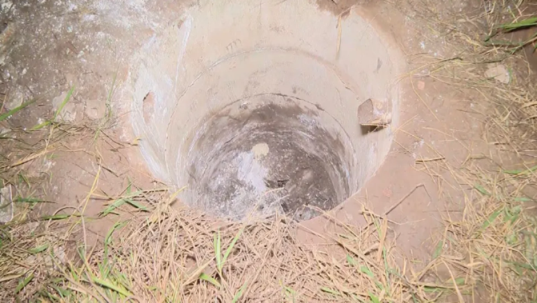Cisterna onde mais três corpos foram encontrados em Planaltina (Reprodução - TV Globo)
