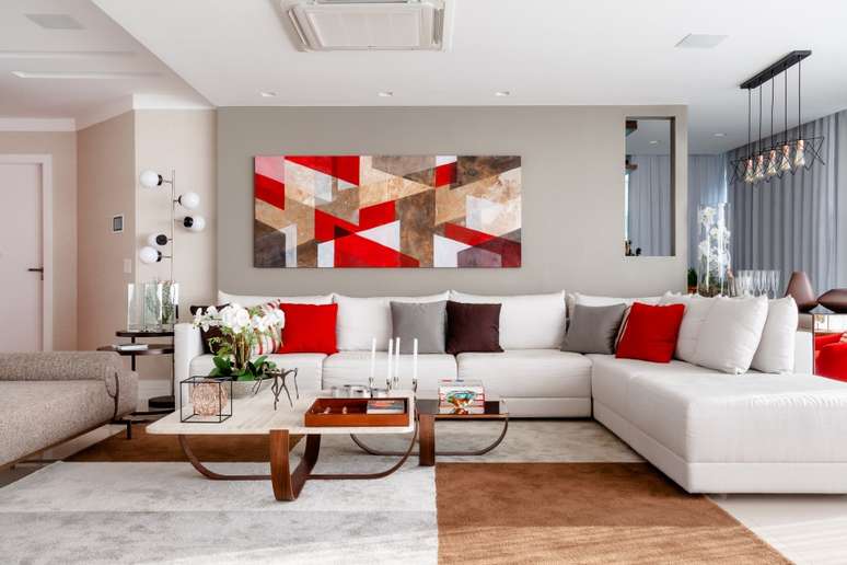 The choice of color palette for the living room, dining room, kitchen and family room, and even the office was defined by the choice of modular units in the kitchen and the pattern of wood used for the doors sliding panels.