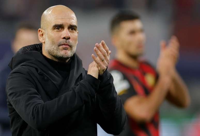 Pep Guardiola elogiou os jogadores do Manchester City contra o RB Leipzig (ODD ANDERSEN / AFP)