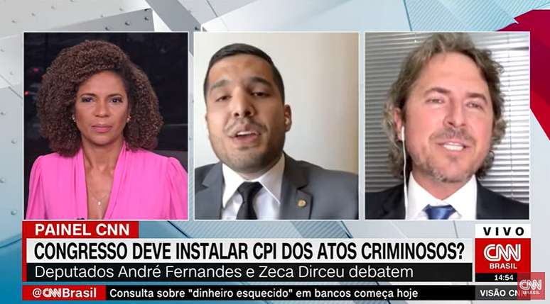 Observados pela apresentadora Luciana Barreto, os deputados André Fernandes e Zeca Dirceu discutiram após uma citação pessoal
