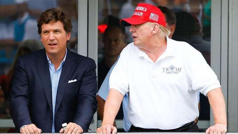 Tucker Carlson with Donald Trump in July 2022 Tucker Carlson with Donald Trump in July 2022