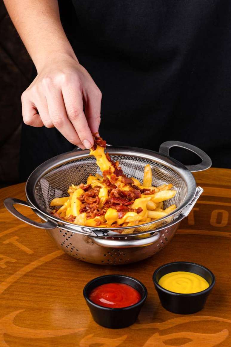 Batata frita com cheddar e bacon, a ‘NY Fries Extreme’