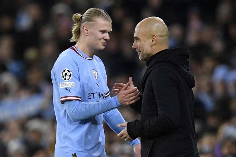 Pep Guardiola substituiu Haaland após centroavante marcar três gols na FA Cup (OLI SCARFF / AFP)