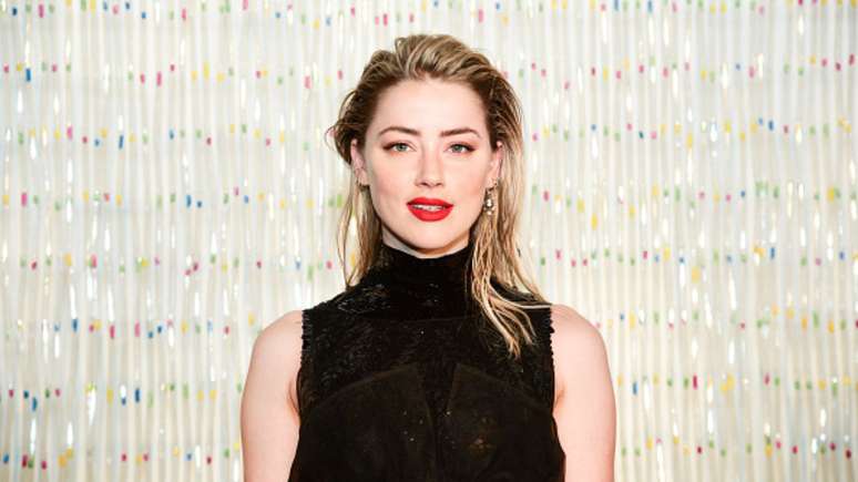 Amber Heard é flagrada com a filha em Madrid após abandonar Hollywood