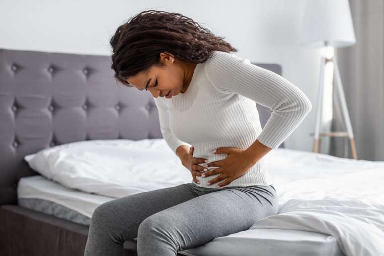 A physical exam is needed to identify the cause of mid-tummy pain. 