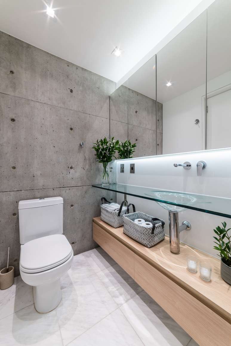 In this bathroom, distributed lighting has enhanced the dimensions.  Project: Studio Guadix
