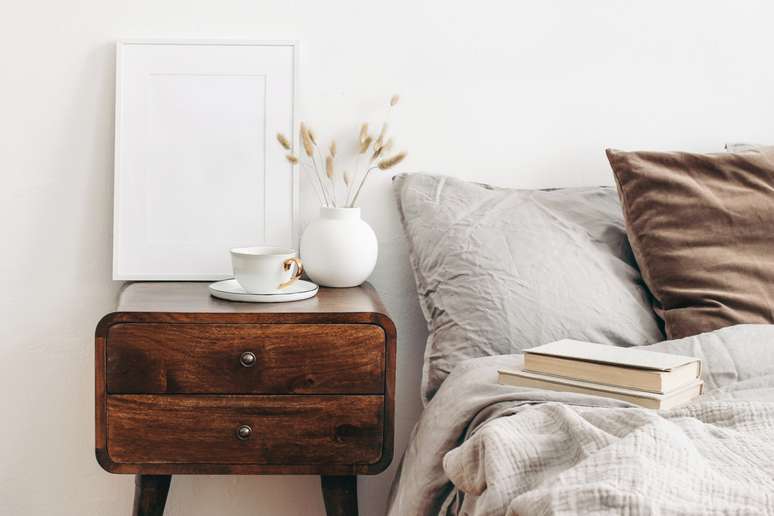 The nightstand should match the bedroom furniture 