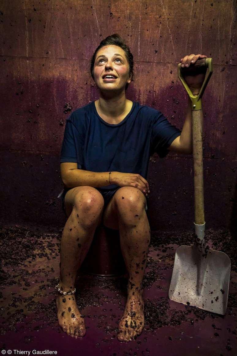 Woman inside a fermentation tank