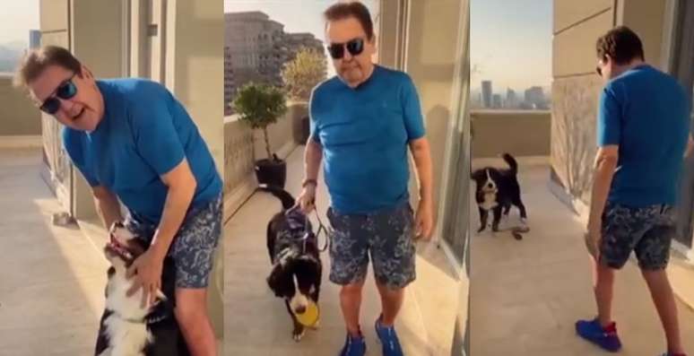 Faustão na sacada da cobertura com um de seus cães: rotina tranquila longe da badalação dos famosos