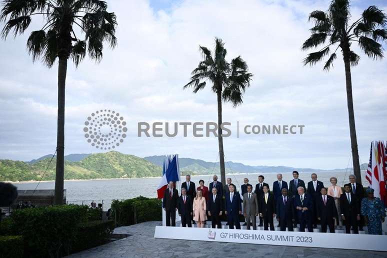 World leaders from G7 and invited countries (top row L-R) Mathias Cormann, Secretary-General of the Organisation for Economic Co-operation and Development (OECD), Managing Director of the IMF Kristalina Georgieva, European Council President Charles Michel, German Chancellor Olaf Scholz, India's Prime Minister Narendra Modi, France's President Emmanuel Macron, US President Joe Biden, Canada's Prime Minister Justin Trudeau, Australia's Prime Minister Anthony Albanese, European Commission President Ursula von der Leyen, Executive Director of the International Energy Agency Fatih Birol, (bottom row L-R) President of the World Bank David Malpass, secretary-general of the United Nations Antonio Guterres, Italy's Prime Minister Giorgia Meloni, Cook Islands Prime Minister Mark Brown, South Korea's Yoon Suk Yeol, Indonesia's President Joko Widodo, Japan's Prime Minister Fumio Kishida, Comoros President Azali Assoumani, Brazil's President Luiz Inacio Lula de Silva, Vietnam's Prime Minister Pham Minh Chinh, Britain's Prime Minister Rishi Sunak, and Director-General of the World Trade Organization Ngozi Okonjo-Iweala pose for a family photo of leaders of the G7 and invited countries during the G7 Leaders' Summit in Hiroshima on May 20, 2023.     BRENDAN SMIALOWSKI/Pool via REUTERS