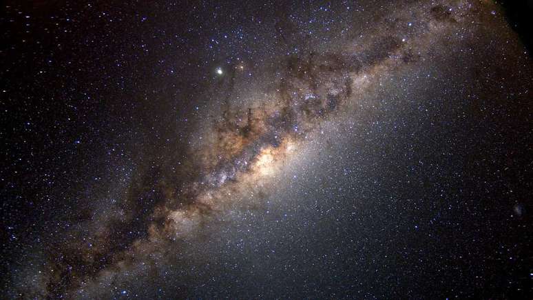 Our galaxy is a barred spiral, but some details about its arms are missing. Our galaxy is a barred spiral, but some details about its arms are missing.