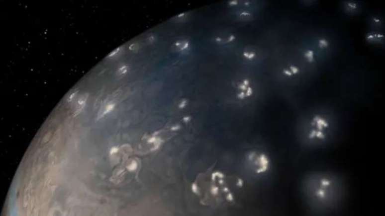 Juno's image of Jupiter with artistic touches to represent storms at the north pole (Image: Playback/NASA/JPL-Caltech/SwRI/JunoCam) Juno's image of Jupiter with artistic touches to represent storms at the north pole (Image: Playback/NASA/JPL-Caltech/SwRI/JunoCam)