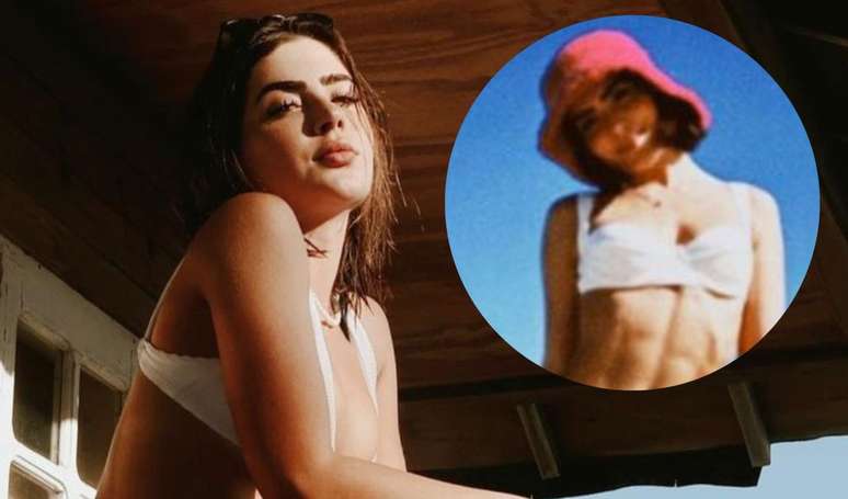 Jade Picon shows off an extremely defined tummy and leaves her bikini up there on the beach.  Photos!