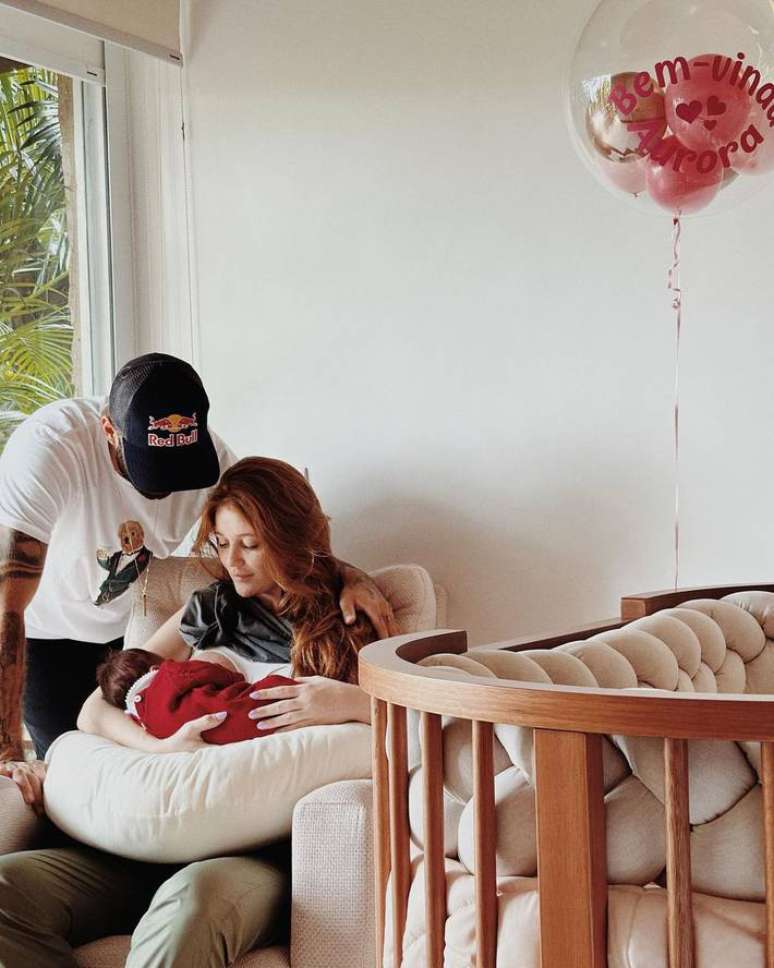 Cintia Dicker and Pedro Scooby with daughter Aurora Cintia Dicker and Pedro Scooby with daughter Aurora