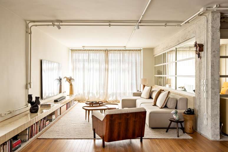 167 m² apartment designed by Memola Estúdio.