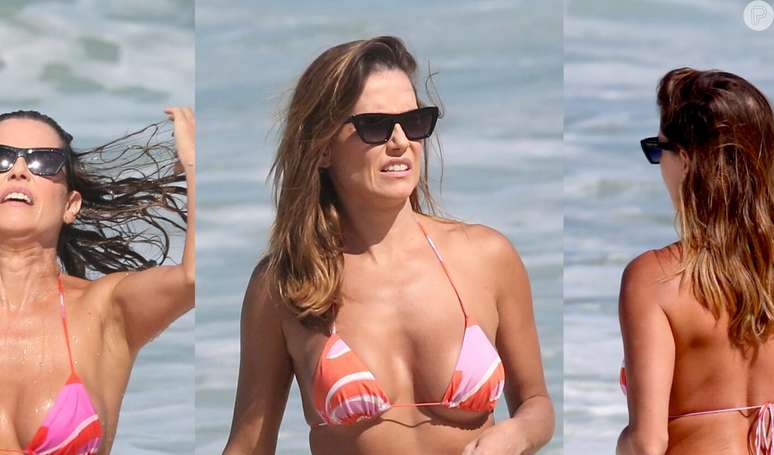 Deborah Secco bets on a trendy thong bikini and shows off her defined butt on a day at the beach.  Photos!