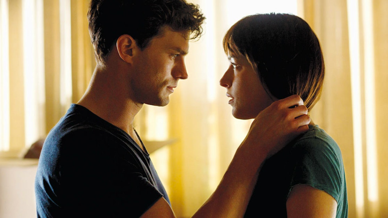 Jamie Dornan e Dakota Johnson como Christian Grey e Ana…