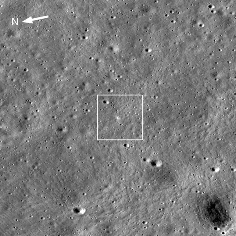 The Chandrayaan-3 lander is in the center of the image, with its dark shadow surrounded by a bright area.