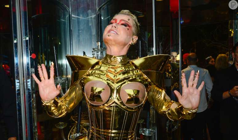 Butt out and more: Xuxa shows off a bold and futuristic costume for a Halloween ball.  Photos!