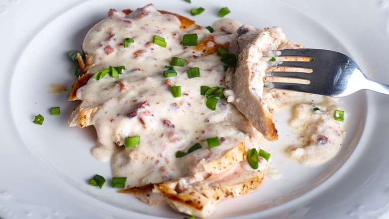Chicken fillet with four cheese sauce for family lunch