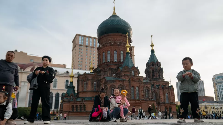 Vladimir Putin is praised on the streets of the ancient Russian city of Harbin Vladimir Putin is praised on the streets of the ancient Russian city of Harbin
