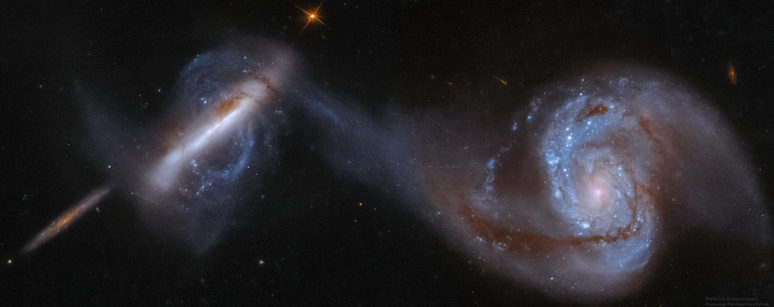 As galáxias de Arp 87 ficam a cerca de 300 milhões de anos-luz da Terra (Imagem: Reprodução/NASA, ESA, Hubble; Harshwardhan Pathak)