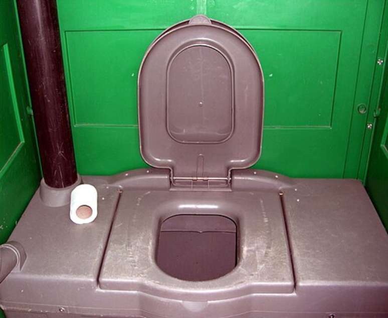 How are chemical toilets cleaned?