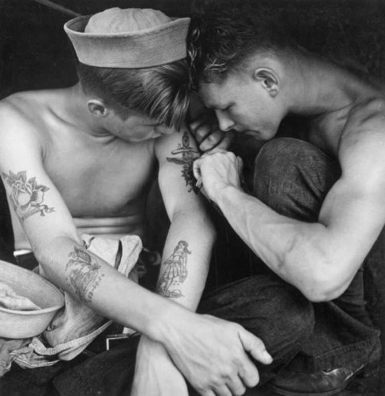 The sailor gets a tattoo. (Source: Wikimedia Commons) The sailor gets a tattoo. (Source: Wikimedia Commons)