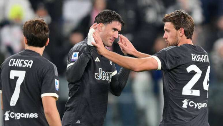 Jogadores da Juventus em partida contra Cagliari