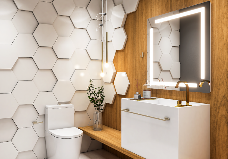 30. Banheiro feminino: revestimento hexagonal + espelho com iluminação especial – Foto: Crismoe