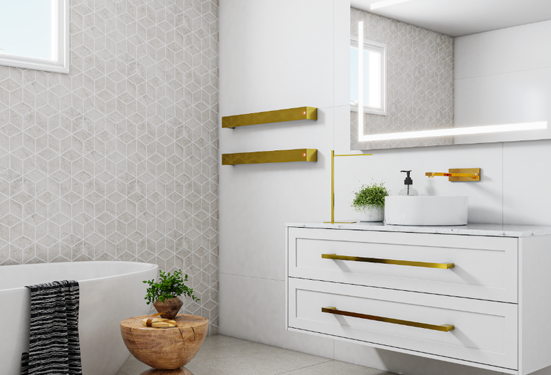 14. Banheiro feminino: metais dourados para um décor sofisticado – Foto: Crismoe