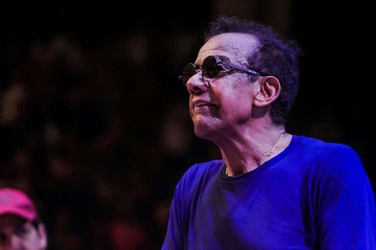 The photographer accuses Jorge Ben Jor of assault at Rio airport