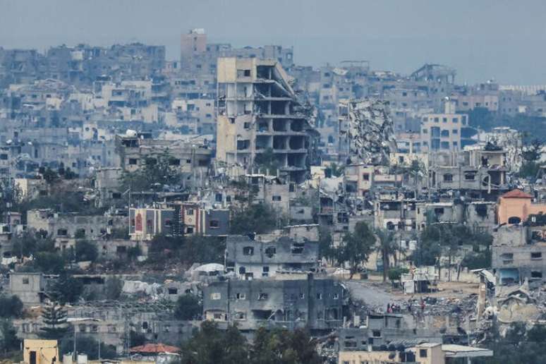 Prédios destruídos por ataques israelenses em Gaza
 28/11/2023   REUTERS/Alexander Ermochenko