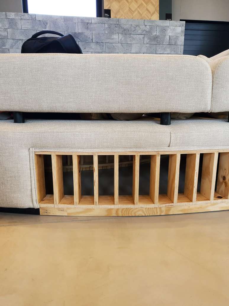 Detail of the organically shaped sofa, also made with MDF panels.