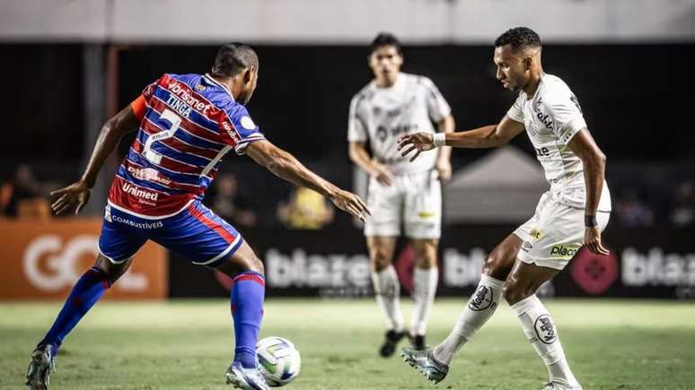 Pai, filho e futebol. – Domingo à noite