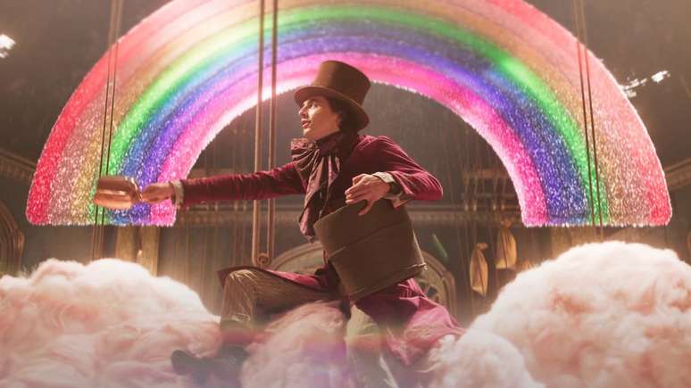 Wonka exagera nas cores, mas mantém texto simples. (Imagem:Divulgação/Warner Bros.)
