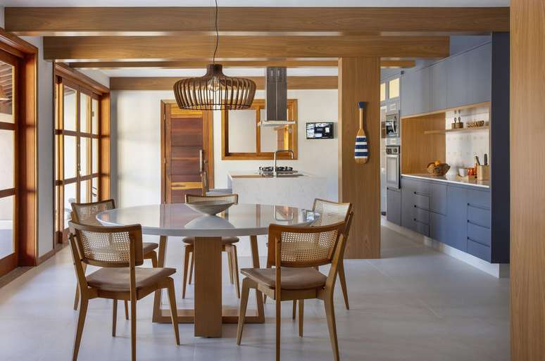 The fish tile covered kitchen island is a highlight of this home