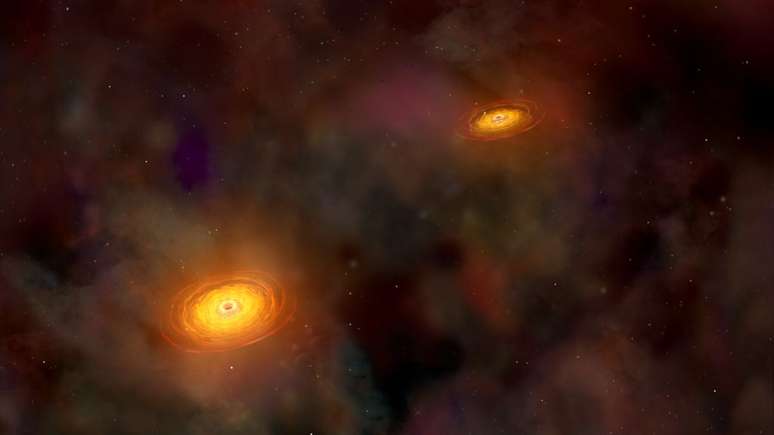 Conceito artístico de dois buracos negros separados por uma curta distância (Imagem: Reprodução/NASA/CXC/A.Hobart)