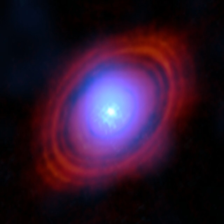 Water vapor in HL Tauri appears depicted in blue, while red indicates dust distribution (Image: Reproduction/ALMA (ESO/NAOJ/NRAO)/S. Facchini et al)