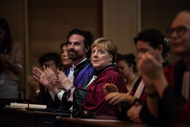 Mathias Vicherat ao lado da Ex-Chanceler da Alemanha Angela Merkel